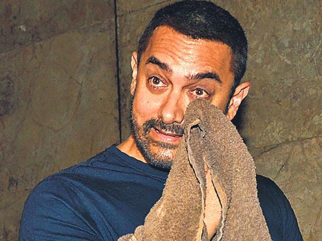 Aamir Khan said his wife Kiran Rao “fears for her child, she fears for the atmosphere around us, she feels scared to open the newspapers every day”.(HT File)