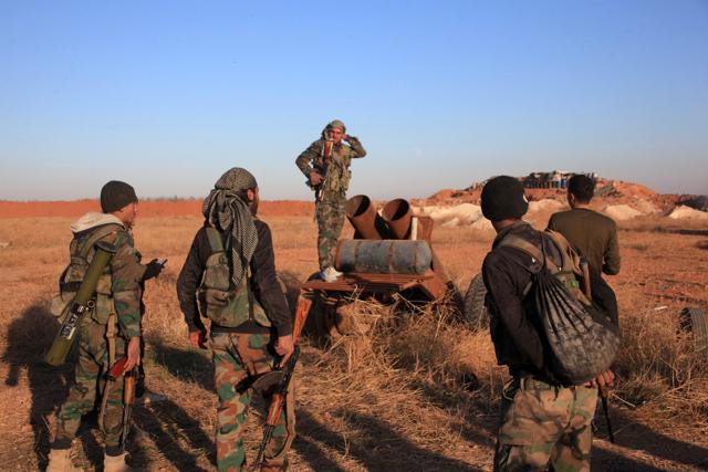 A group of Syrian pro-government forces inspect a home-made rocket launcher during a military operation against the Islamic State (IS) Group near Aleppo. Experts say one of the root causes of the brutal Syrian civil war, which has facilitated the rise of IS, was the 2006-2010 drought the country faced. (AFP Photo) A group of Syrian pro-government forces inspect a home-made rocket launcher during a military operation against the Islamic State (IS) Group near Aleppo. Experts say one of the root causes of the brutal Syrian civil war, which has facilitated the rise of IS, was the 2006-2010 drought the country faced. (AFP Photo)