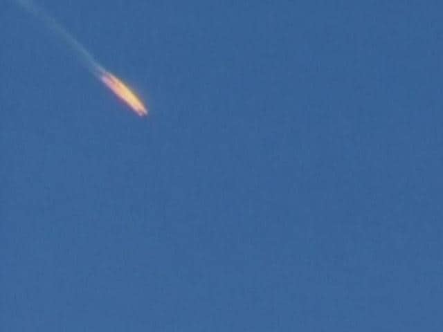 A war plane crashing in flames in a mountainous area in northern Syria after it was shot down by Turkish fighter jets near the Turkish-Syrian border, is seen in this still image taken from video November 24, 2015. Turkish fighter jets shot down a Russian-made warplane near the Syrian border on Tuesday after repeatedly warning it over air space violations, Turkey officials said, but Moscow said it could prove the jet had not left Syrian air space.(REUTERS)