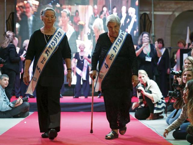 The killings were part of Hitler’s theory of ‘Final Solution to the Jewish Question’. Judith Rosenzweig, 81, (R) and Rivka Shtanger, 74, (L) both Holocaust survivors, walk on a runway in Israel on Tuesday. (REUTERS)