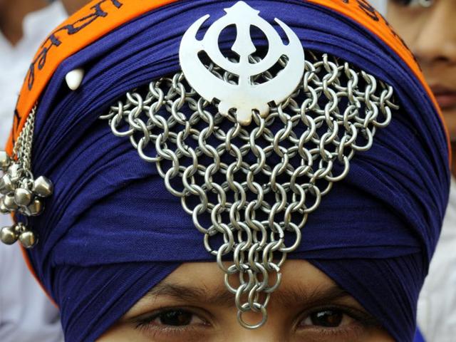A Sikh martial arts student gets ready for the Gurupurab procession, in New Delhi. On the birth anniversary of Sikhism’s first guru, devotees carry out large processions and special prayer gatherings at all gurudwaras across the world. (Sonu Mehta/HT Photo) A Sikh martial arts student gets ready for the Gurupurab procession, in New Delhi. On the birth anniversary of Sikhism’s first guru, devotees carry out large processions and special prayer gatherings at all gurudwaras across the world. (Sonu Mehta/HT Photo)