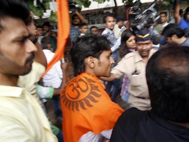 A Hindu Sena activist shouts slogans during a protest outside Aamir Khan's residence in Mumbai on Tuesday, Nov. 24, 2015. Aamir has earned the ire from various groups for his comment on rising intolerance in the country and that his wife has discussed the possibility of leaving the country. (AP)