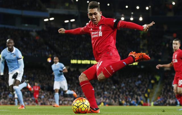 Liverpool's Roberto Firmino crosses the ball leading to Manchester City's Eliaquim Mangala scoring an own goal and Liverpool's first. (Reuters Photo) Liverpool's Roberto Firmino crosses the ball leading to Manchester City's Eliaquim Mangala scoring an own goal and Liverpool's first. (Reuters Photo)