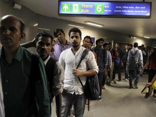 People line up at Rajeev Chowk Metro station, in New Delhi.(Sonu Mehta/ HT File Photo)