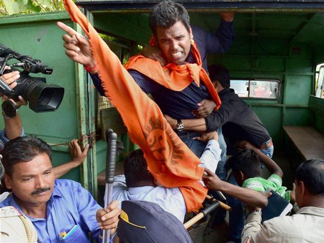 Hindu Sena activist shout slogans outside the residence of actor Aamir Khan in protest against his statement, in Mumbai on Tuesday. (PTI)