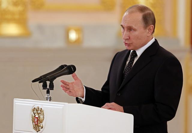 Russia's President Vladimir Putin delivers a speech during a ceremony of receiving diplomatic credentials from foreign ambassadors at the Kremlin, in Moscow. (AFP Photo)