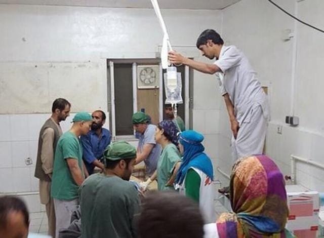 In this photograph released by Medecins Sans Frontieres (MSF), Afghan MSF surgeons work in an undamaged part of the MSF hospital in Kunduz after the operating theatres were destroyed in an air strike. (AFP) In this photograph released by Medecins Sans Frontieres (MSF), Afghan MSF surgeons work in an undamaged part of the MSF hospital in Kunduz after the operating theatres were destroyed in an air strike. (AFP)