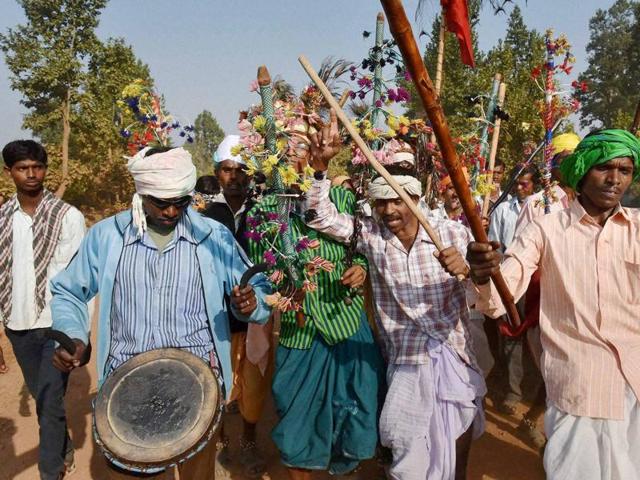 Hundreds of tribals from Madhya Pradesh, Chhattisgarh and Maharashtra arrive to take part in annual ‘Madai’ fair on the occasion of Kartik Purnima at Kharradhar village in Balaghat, Madhya Pradesh on Wednesday. (PTI) Hundreds of tribals from Madhya Pradesh, Chhattisgarh and Maharashtra arrive to take part in annual ‘Madai’ fair on the occasion of Kartik Purnima at Kharradhar village in Balaghat, Madhya Pradesh on Wednesday. (PTI)