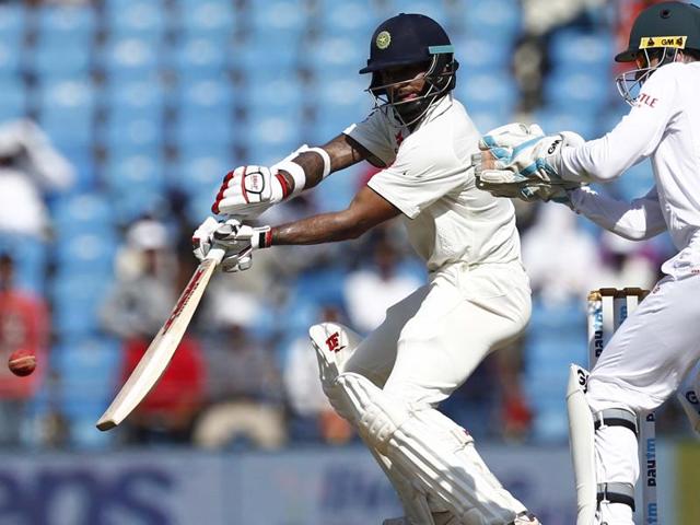India’s Shikhar Dhawan hits a shot during the second innings as South African wicketkeeper Dane Vilas watches. (Santosh Harhare/HT Photo) India’s Shikhar Dhawan hits a shot during the second innings as South African wicketkeeper Dane Vilas watches. (Santosh Harhare/HT Photo)