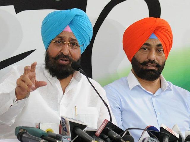 PPCC president Partap Singh Bajwa (left) and Lok Sabha MP from Amritsar Capt Amarinder Singh. PPCC president Partap Singh Bajwa (left) and Lok Sabha MP from Amritsar Capt Amarinder Singh.