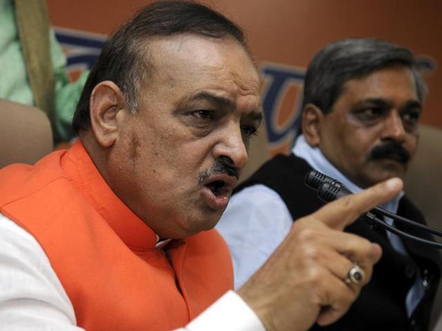 BJP MLA OP Sharma thrashing one of the JNU students who were protesting against the arrest of JNUSU President Kanhaiya Kumar during a clash between the advocates and the students outside the Patiala House Courts. (PTI Photo) BJP MLA OP Sharma thrashing one of the JNU students who were protesting against the arrest of JNUSU President Kanhaiya Kumar during a clash between the advocates and the students outside the Patiala House Courts. (PTI Photo)