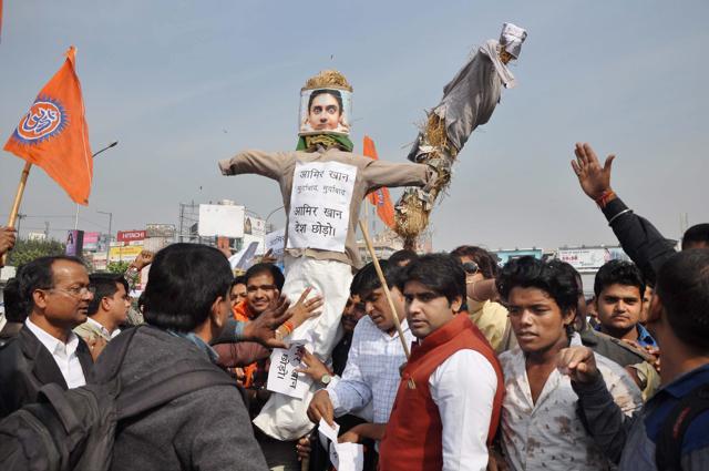 Hindu Sena activists carry the effigy of actor Aamir Khan during their protest against him following his remarks over growing intolerance in the country in Noida on Wednesday. (PTI) Hindu Sena activists carry the effigy of actor Aamir Khan during their protest against him following his remarks over growing intolerance in the country in Noida on Wednesday. (PTI)