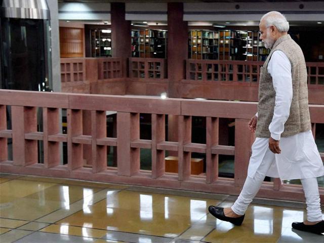 Prime Minister Narendra Modi at the inauguration of an exhibition on making of the Constitution by the Constituent Assembly, at Parliament Library, in New Delhi . (PTI)