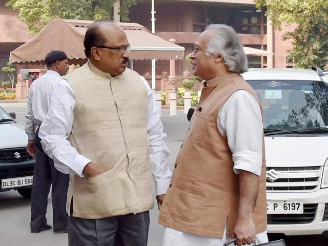 Senior Congress leaders Jairam Ramesh and KV Thomas at the first day of winter session. (PTI)