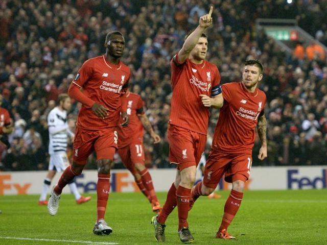 Liverpool manager Juergen Klopp, Alberto Moreno, Simon Mignolet and Kolo Toure celebrates at the end of the match against Bordeaux. (Reuters Photo) Liverpool manager Juergen Klopp, Alberto Moreno, Simon Mignolet and Kolo Toure celebrates at the end of the match against Bordeaux. (Reuters Photo)