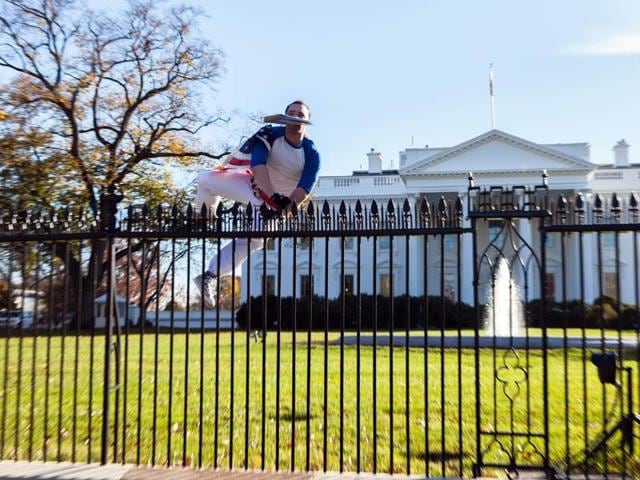 A man gestures after jumping a fence at the White House on Thursday, Nov. 26, 2015, in Washington. President Barack Obama and his wife and daughters were spending Thanksgiving the holiday at the White House. (AP Photo) A man gestures after jumping a fence at the White House on Thursday, Nov. 26, 2015, in Washington. President Barack Obama and his wife and daughters were spending Thanksgiving the holiday at the White House. (AP Photo)