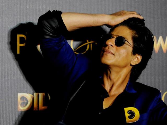 SRK strikes a pose during the music launch event. (AFP)
