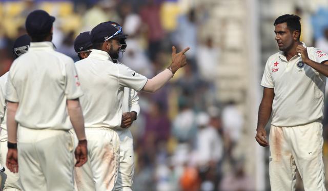 India captain Virat Kohli gestures at spinner Ravichandran Ashwin, right, as he takes another South African wicket, on the third day of the third cricket test match between the two countries in Nagpur. (AP Photo) India captain Virat Kohli gestures at spinner Ravichandran Ashwin, right, as he takes another South African wicket, on the third day of the third cricket test match between the two countries in Nagpur. (AP Photo)