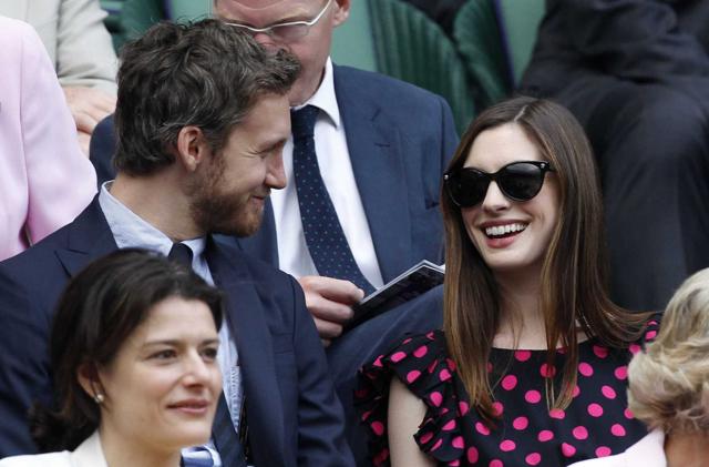 Anne Hathaway and Adam Shulman at a tennis match. (AP) Anne Hathaway and Adam Shulman at a tennis match. (AP)