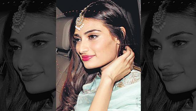 If you are wearing a maangtika, like Athiya Shetty here, skip earrings and neckpieces. You could just do with a cocktail ring. (Yogen Shah) If you are wearing a maangtika, like Athiya Shetty here, skip earrings and neckpieces. You could just do with a cocktail ring. (Yogen Shah)