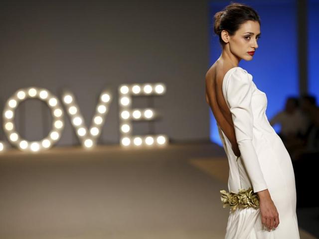 A model presents another creation by Miguel Armario. The creations as well as the models were a sight to behold. (REUTERS)