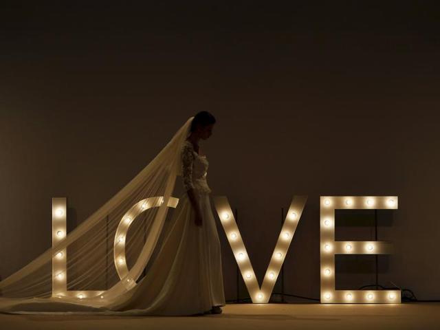 A model walks the ramp at the Sevilla de Boda (Seville Wedding) fashion show. (REUTERS)