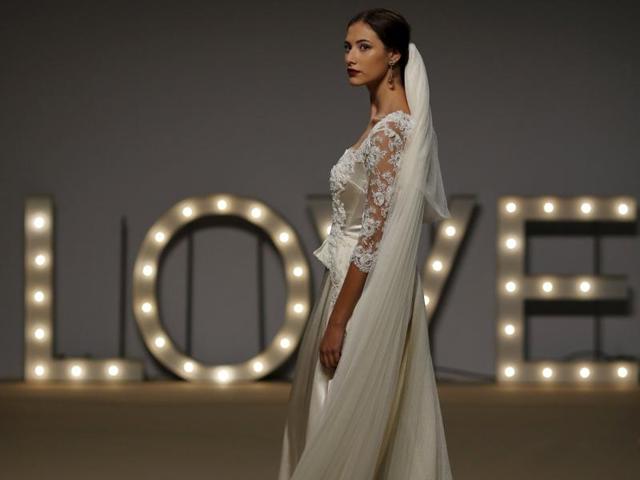 What’s purer than white? A model presents a creation by Maria Cristina Hernandez. (REUTERS)