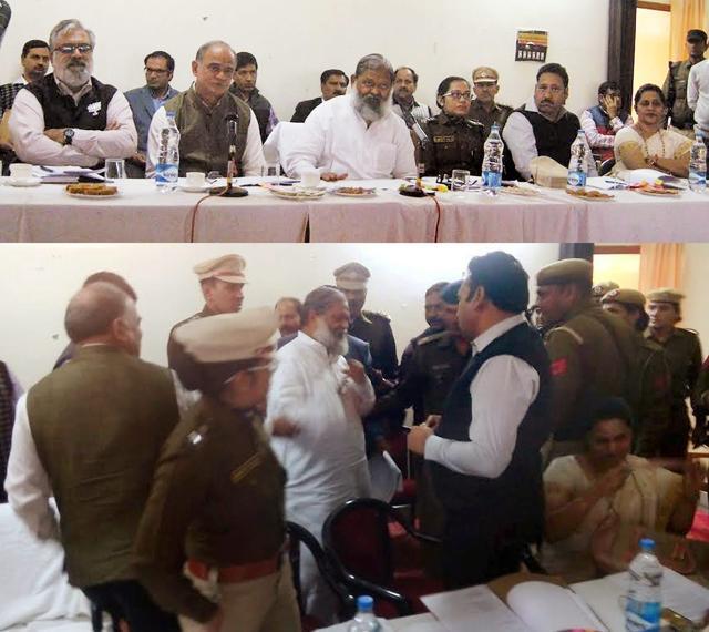 (Top) Haryana health minister Anil Vij seated next to Fatehabad SP Sangeeta Kalia during the meeting, (Below) Vij walks out of the meeting after an argument with SP Kalia who refused to leave even when the minister told her to "get out" in Fatehabad, Haryana on Friday. (PTI) (Top) Haryana health minister Anil Vij seated next to Fatehabad SP Sangeeta Kalia during the meeting, (Below) Vij walks out of the meeting after an argument with SP Kalia who refused to leave even when the minister told her to "get out" in Fatehabad, Haryana on Friday. (PTI)