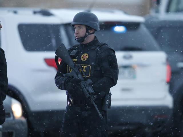 Two women are evacuated from a building where a shooter was suspected to be still holed up in Colorado Springs, Colorado. (Reuters Photo) Two women are evacuated from a building where a shooter was suspected to be still holed up in Colorado Springs, Colorado. (Reuters Photo)