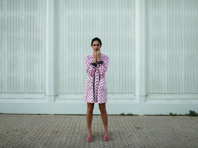 Spanish model Maria Flores, 22, poses backstage during a break in comfy pyjamas but still strikes a gorgeous pose. (REUTERS)