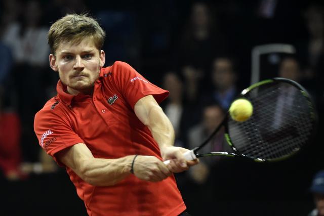 Belgium's David Goffin returns the ball to Britain's Kyle Edmund during their tennis match on the first day of the Davis Cup between Belgium and Britain at the Flanders Expo in Ghent. (AFP Photo) Belgium's David Goffin returns the ball to Britain's Kyle Edmund during their tennis match on the first day of the Davis Cup between Belgium and Britain at the Flanders Expo in Ghent. (AFP Photo)