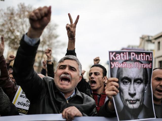 Protesters shout slogans and hold a poster depicting Russian President Vladimir Putin and reading "Putin, killer!" during a demonstration against Russia in Istanbul on Friday. Russia's foreign minister Sergei Lavrov said that Ankara has crossed the line by shooting down a Russian warplane this week and warned the incident could severely undermine Turkey's interests. (AFP photo) Protesters shout slogans and hold a poster depicting Russian President Vladimir Putin and reading "Putin, killer!" during a demonstration against Russia in Istanbul on Friday. Russia's foreign minister Sergei Lavrov said that Ankara has crossed the line by shooting down a Russian warplane this week and warned the incident could severely undermine Turkey's interests. (AFP photo)