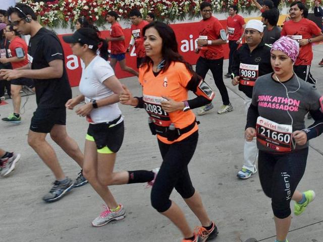 People participating in the Airtel Delhi Half Marathon 2015 in New Delhi on Sunday. (PTI Photo) People participating in the Airtel Delhi Half Marathon 2015 in New Delhi on Sunday. (PTI Photo)