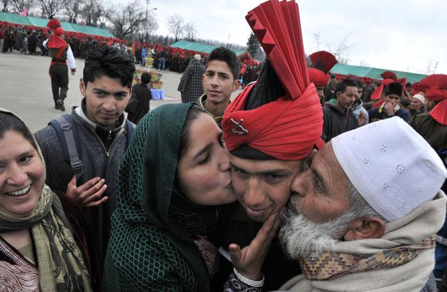 One of the new recruits with his relatives after passing out parade. (Waseem Andrabi/ HT Photo ) One of the new recruits with his relatives after passing out parade. (Waseem Andrabi/ HT Photo )