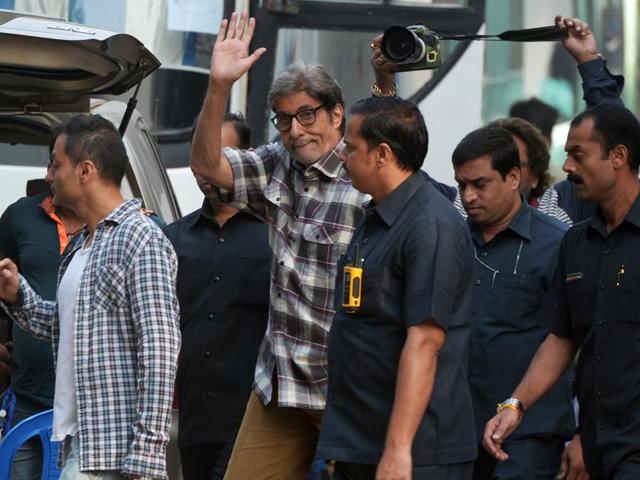 Amitabh Bachchan waving to his fans who had gathered in large numbers to see the superstar. (AFP)