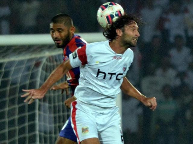Players of North East United FC (white) and Delhi FC during the ISL match at Indira Gandhi Athletic Stadium in Guwahati on November 28. (PTI Photo) Players of North East United FC (white) and Delhi FC during the ISL match at Indira Gandhi Athletic Stadium in Guwahati on November 28. (PTI Photo)
