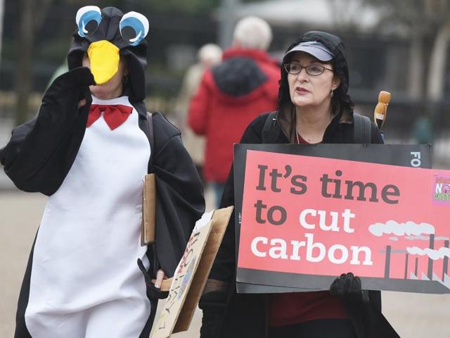 Environmental activists take part in a rally in front of the White House, in Washington, DC. (AFP Photo) Environmental activists take part in a rally in front of the White House, in Washington, DC. (AFP Photo)