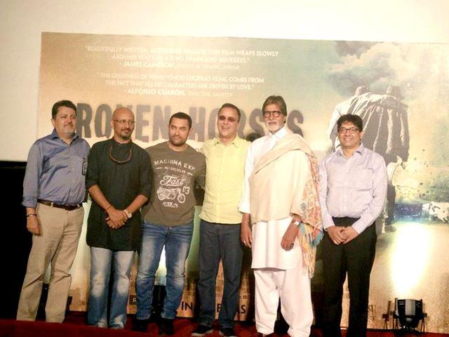 Vidhu Vinod Chopra with Aamir Khan and Amitabh Bachchan at the trailer launch of Broken Horses. (AFP) Vidhu Vinod Chopra with Aamir Khan and Amitabh Bachchan at the trailer launch of Broken Horses. (AFP)