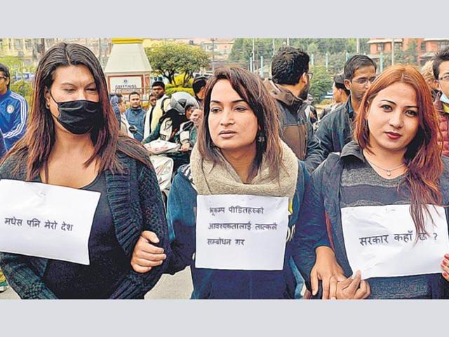 Ethnic Madhesi protesters throw stones and bricks at Nepalese policemen in Birgunj, a town on the border with India and Nepal.(AP Photo) Ethnic Madhesi protesters throw stones and bricks at Nepalese policemen in Birgunj, a town on the border with India and Nepal.(AP Photo)