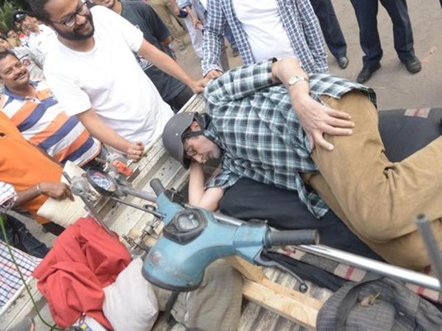 Amitabh Bachchan caught in a candid moment on the sets of TE3N. (TWITTER)