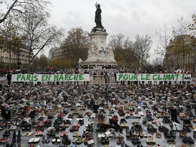 Hundreds of pairs of shoes are displayed at the Place de la Republique, in Paris, as part of a symbolic and peaceful rally called by the NGO Avaaz "Paris sets off for climate". About 150 world leaders are gathering around Paris for high-stakes climate talks, and activists are holding marches and protests around the world to urge them to reach a strong agreement to slow global warming. (AP Photo) Hundreds of pairs of shoes are displayed at the Place de la Republique, in Paris, as part of a symbolic and peaceful rally called by the NGO Avaaz "Paris sets off for climate". About 150 world leaders are gathering around Paris for high-stakes climate talks, and activists are holding marches and protests around the world to urge them to reach a strong agreement to slow global warming. (AP Photo)