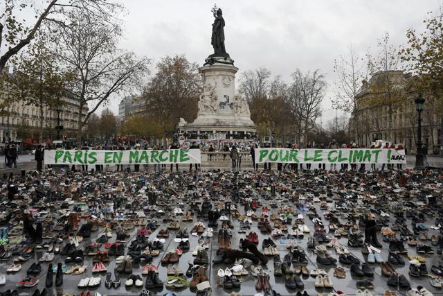 Hundreds of pairs of shoes are displayed at the Place de la Republique, in Paris, as part of a symbolic and peaceful rally called by the NGO Avaaz "Paris sets off for climate". (AP Photo) Hundreds of pairs of shoes are displayed at the Place de la Republique, in Paris, as part of a symbolic and peaceful rally called by the NGO Avaaz "Paris sets off for climate". (AP Photo)