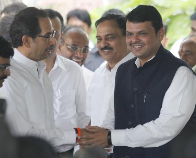 Maharashtra chief minister Devendra Fadnavis (right) is not keen on joining hands with the NCP. For him, the Shiv Sena is a safer option to the “tainted” NCP. He has established direct contact with Sena chief Uddhav Thackeray (left). (Anshuman Poyrekar/HT photo)