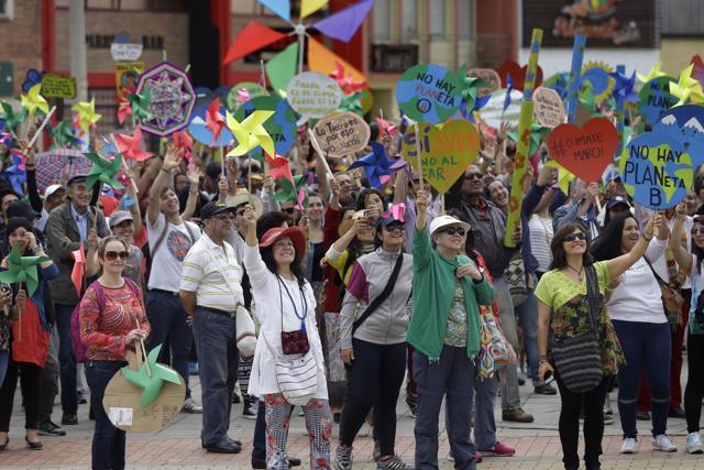 Protesters take part in a silent march calling for ambitious action to tackle climate change, in Bogota, Colombia. (AP Photo) Protesters take part in a silent march calling for ambitious action to tackle climate change, in Bogota, Colombia. (AP Photo)