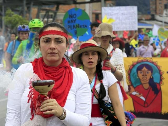 Women activists take part in a march ahead of the 2015 Paris Climate Change Conference in Bogota, Colombia. (Reuters Photo) Women activists take part in a march ahead of the 2015 Paris Climate Change Conference in Bogota, Colombia. (Reuters Photo)