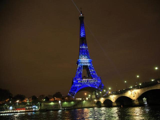 An artwork entitled 'One Heart One Tree' by artist Naziha Mestaoui is displayed on the Eiffel tower, ahead of the 2015 Paris Climate Conference, in Paris. (AP Photo) An artwork entitled 'One Heart One Tree' by artist Naziha Mestaoui is displayed on the Eiffel tower, ahead of the 2015 Paris Climate Conference, in Paris. (AP Photo)