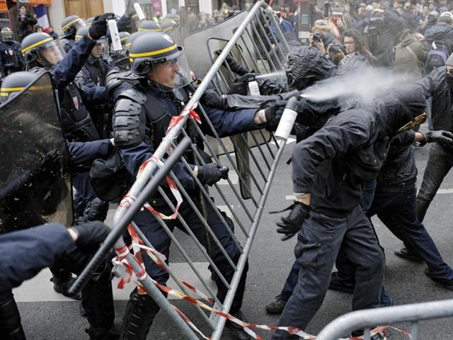 Policemen fight with activists during a protest ahead of the 2015 Paris Climate Conference at the Place de la Republique, in Paris. (AP Photo) Policemen fight with activists during a protest ahead of the 2015 Paris Climate Conference at the Place de la Republique, in Paris. (AP Photo)