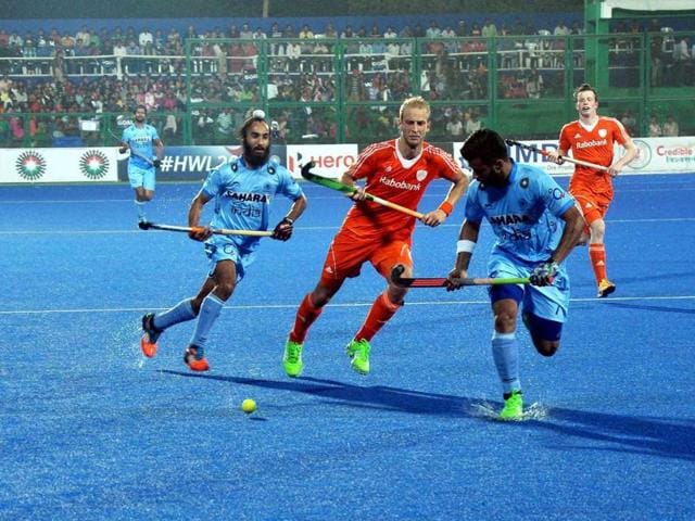 Indian and Dutch players in action during Hockey World League Final in Raipur on Monday.(PTI)