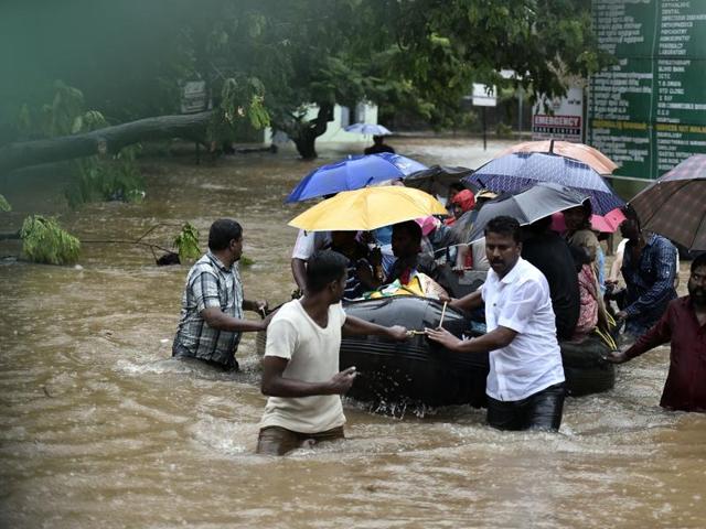 As there has been very heavy rainfall over the last 24 hours leaving several areas inundated, patients admitted to a hospital in Tambaram were shifted to a Govt hospital in Central and Royapettah in Chennai, India on Tuesday. (HT Photo)