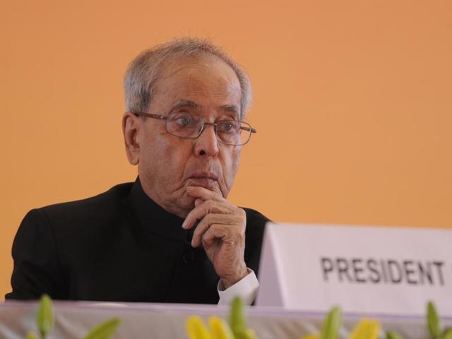 President Pranab Mukherjee lighting a lamp to inaugurate Amul's Feed Manufacturing Plant at Kapadwanj Tuluka, in Kheda.(PTI Photo)